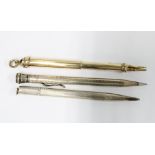 Sampson Mordan & Co gold plated propelling pencil, Walker & Hall silver propelling pencil and a