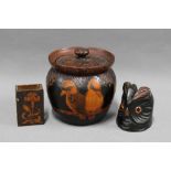 Pokerwork tobacco jar together with two match box holders, one inthe form of an owl. 12cm. (3)