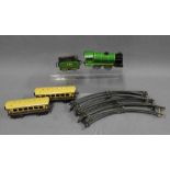 Early to mid 20th century tin plate train set with engine, two carriages, another and track (a lot)