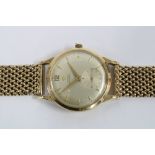 Gents vintage 9ct gold Omega Automatic wristwatch, champagne dial with Arabic numeral at 12 and