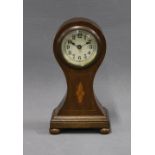 Mahogany and inlaid clock of small proportions, with Arabic numerals and raised on bun feet, 16cm