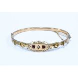Late 19th / early 20th century 9ct gold ruby and seed pearl bracelet, stamped 9ct