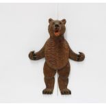 Black Forest novelty carved wood bear wall plaque with open mouth and moving limbs, 21cm