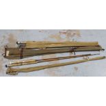 Two vintage fishing canes with canvas covers (2)