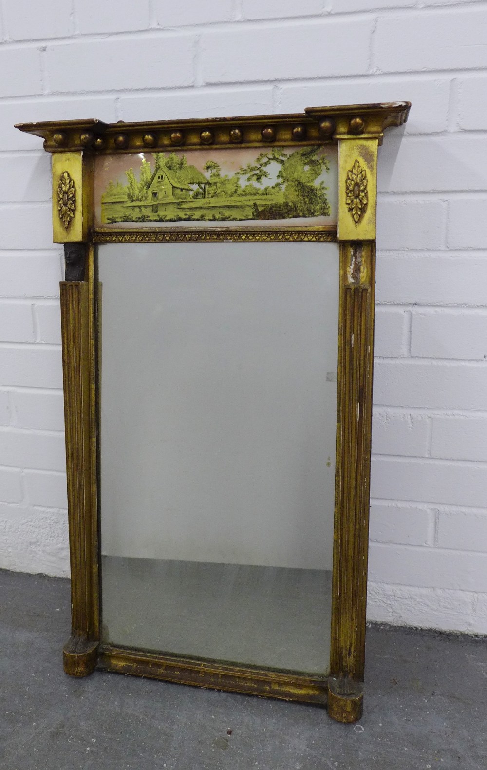 Giltwood pier mirror with painted landscape top panel, (a/f with one figurehead lacking) , 80 x 52cm