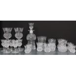 A part suite of Edinburgh Crystal thistle patterned glass to include a small decanter and stopper,
