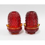 A pair of moulded red glass nightlights, 12cm (2)