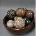 Collection of hardstone carpet bowls and a wooden fruit bowl (a lot)