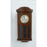 Early 20th century wall clock with a silvered dial with Arabic numerals, 76 x 33cm