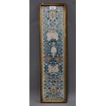 Asian silk embroidered panel with figures and cats, framed under glass 63 x 17cm overall