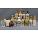 Twelve late 19th / early 20th century stoneware bottles and a hot water flask (13)