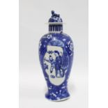 Chinese blue and white vase and cover, prunus pattern with figural panel, 32cm.