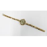 Ladies 9ct gold wrist watch on 9ct gold bracelet strap with love heart shaped links