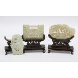 Three carved jade plaques with wooden stands (one has worked loose) tallest 12cm including stand (3)