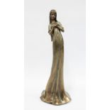 Bronze patinated pottery figure of a girl wearing a long dress, 36cm.