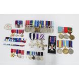 Collection of copy / replica medals, examples include Distinguished Flying Cross with ribbons,