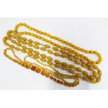 Three strands of faux amber beads (3)