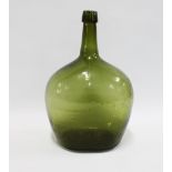 Green glass wine bottle, 33cm high.