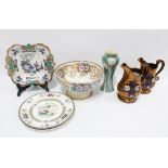 Mixed Staffordshire pottery to include a punch bowl, plates, copper lustre jugs, etc (7) punch