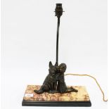 Art Deco table lamp base with a bronze patinated spelter figure group off a girl hugging her dog, on