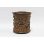 Carved bamboo brush pot, decorated with a flowering water lily and other foliage, 17 x 16cm.