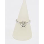 White gold diamond solitaire ring, the bright cut stone of approx 1.01ct, illusion claw setting, the