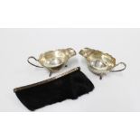 Pair of George V silver sauce boats, Birmingham 1934, 16cm long and a silver mounted table brush,