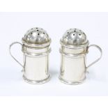 A pair of Victorian novelty silver pepper pots in the form of miniature tankards, mark of