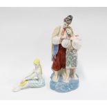 Ukrainian porcelain figure of a seated girl and another of a Cossack and his sweetheart, 30cm (2)