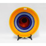 Poole Pottery charger by Alan Clarke, in orange, blue and red, signed and dated 99, 41cm