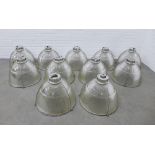 Set of eleven industrial vintage style glass ceiling pendant shades with metal mounts, approx 42 x