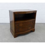 Mahogany veneered media unit with pull out slide and serpentine top, 76 x 79 x 43cm