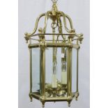 Hexagonal brass and glass panelled lantern light fitting, 34 x 67cm (one glass panel, chipped at