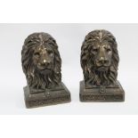 A pair of modern Lions Head bookends, faux bronze patinated resin, 19cm high (2)