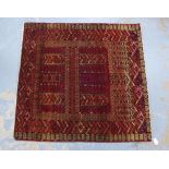 Tekke prayer rug with red field and all-over geometric and serrated patterns, 135 x 127cm.