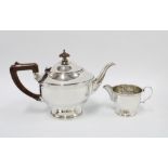 George V silver teapot and matching cream jug, Birmingham 1934, (2)