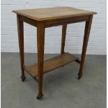 Arts & Crafts oak side table, rectangular top with conforming underier, raised on square tapering