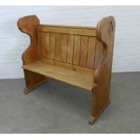 Panelled pine two seater highback settle. 111 x 118 x 52cm.