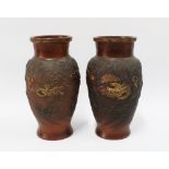 A pair of Chinese terracotta dragon vases, impressed seal mark, 24cm (2)