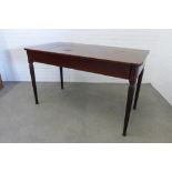 Early 19th century mahogany and inlay serving table with a rectangular top and re-entrant rounded