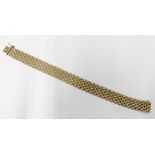 14ct gold flat link bracelet with textured finish, clasp stamped Italy 14kt