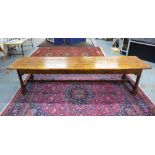 Large elm refectory table with rectangular solid top and rustic stretcher, approx 340cm long x