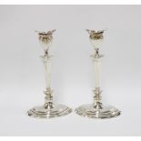 An Edwardian pair of silver candlesticks, Hamilton & Inches, Edinburgh 1906, Georgian style with
