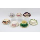 A collection of 18th & 19th century teacups and saucers to include Wedgwood majolica and Gaudy