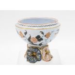 Emile Galle Faience pot painted with birds and and flowers, on a floral base, marked E. Galle, (a/f)