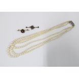 Cultured pearl triple strand necklace with 9ct white gold fastening and two late 19th / early 20th