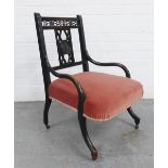 Victorian ebonised nursing chair with pink upholstered seat. 75 x 50 x 50cm.