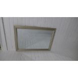 Contemporary rectangular framed wall mirror. 87 x 62cm.