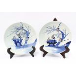 Two Chinese provincial blue and white shallow dishes / plates, with birds and blossom tree
