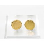 A pair of Arabic gold coin cufflinks mounted in unmarked yellow metal (2)